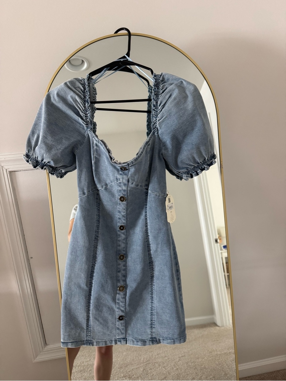 Clothing Tag with Dog in Background